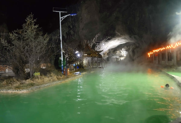 Tiansheng Qiao Natural Limestone Arch Hot Spring Oasis